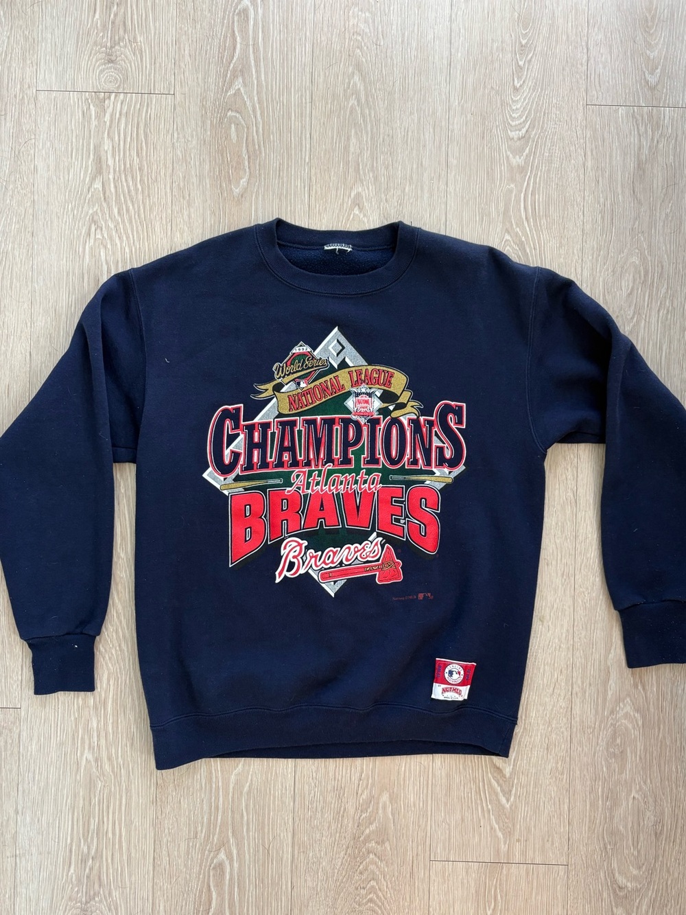 Atlanta Braves Champions Navy Crewneck Sweatshirt - Official Team Graphic